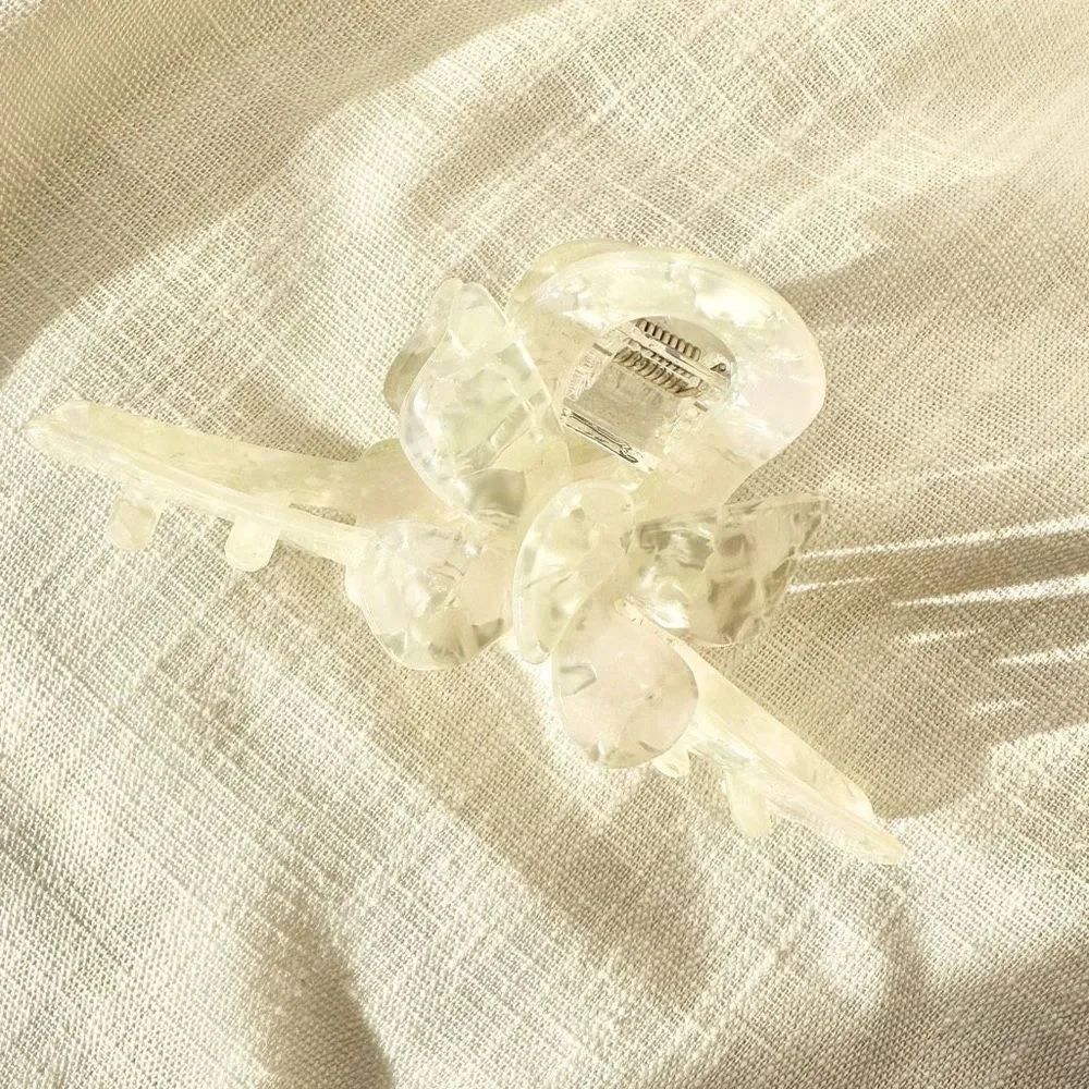 Off-white pearlescent butterfly hair claw